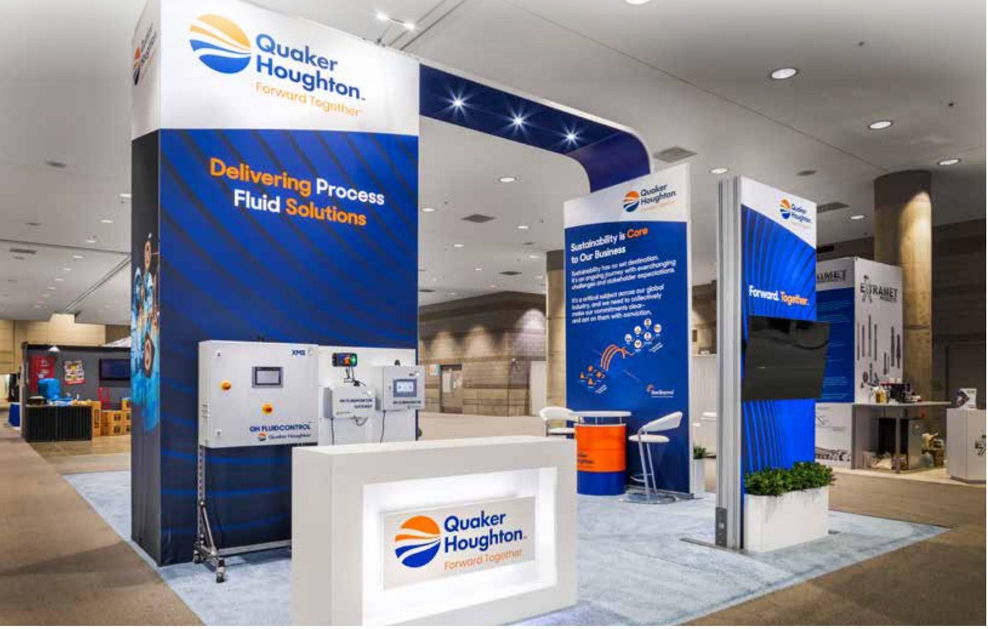 An island exhibit with tall backlit towers and a lit counter
